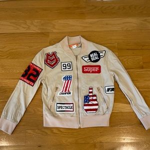 Doll’s Kill Tan Patch Bomber Jacket